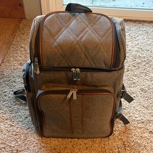 Picnic cooler backpack complete with glasses, utensils and blanket